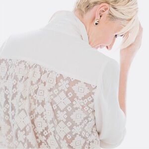 Classic Chico’s cream shirt. Tie bottom lace back